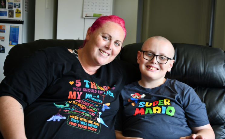 Smiling parent and child at home accessing MyCareSpace's free NDIS matching service for disability and aged care supports across Australia.