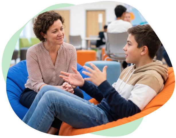 Young man with a psychologist having behaviour support