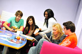 young people chatting around a coffee table
