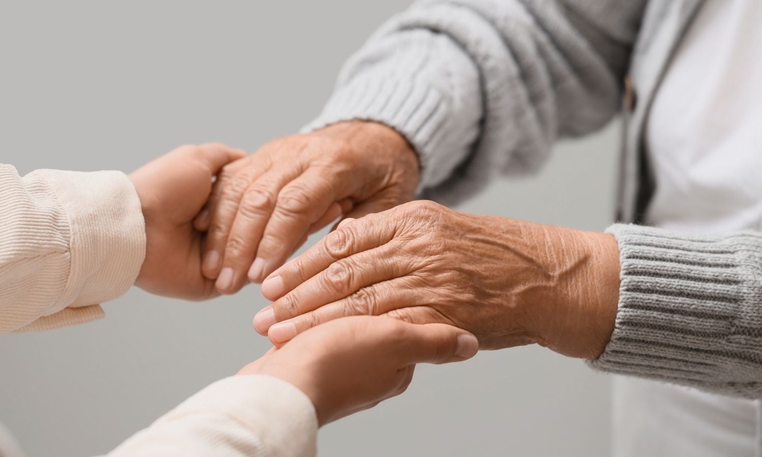 Hands holding