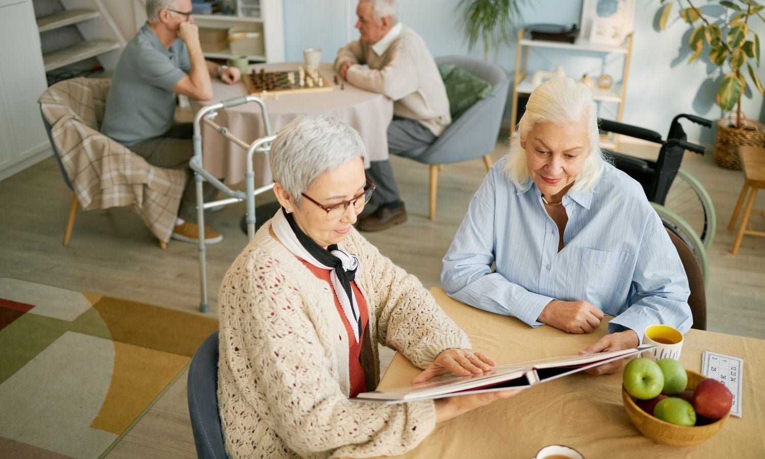 two old lady looking at some documents