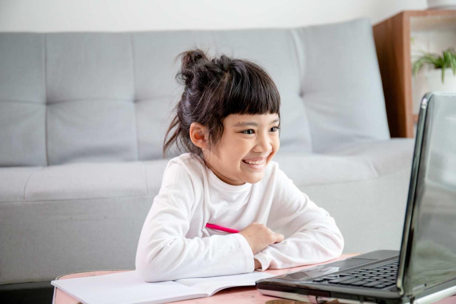 Child infront of laptop