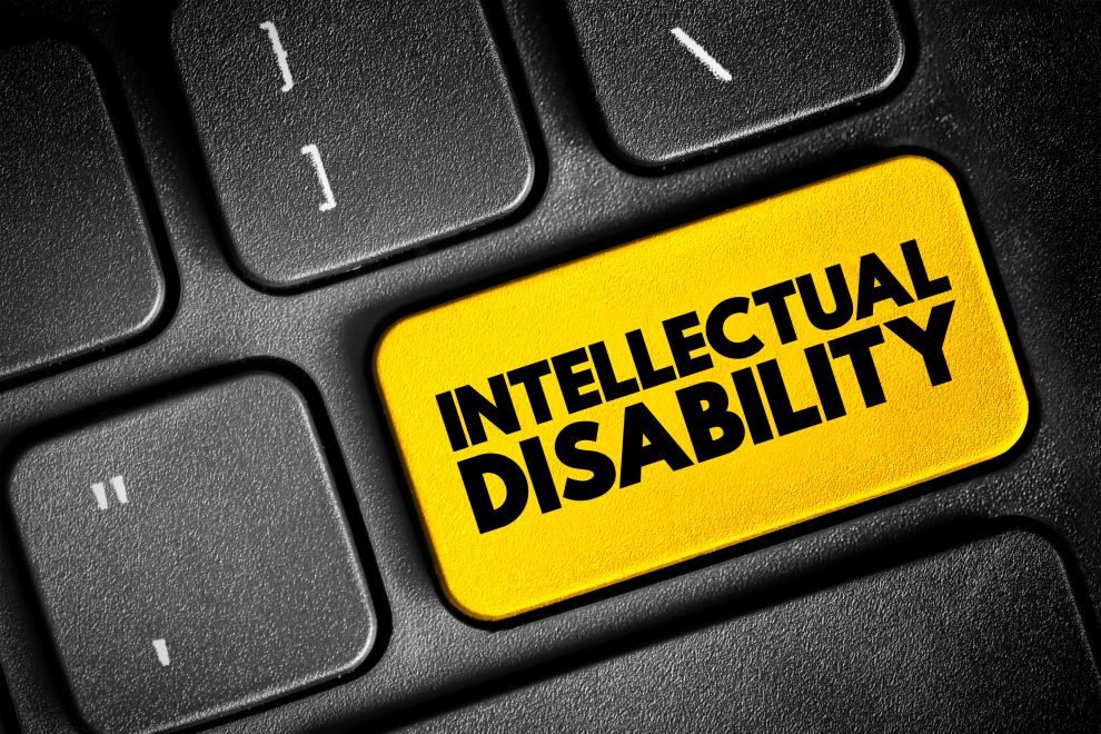 Intellectual Disability button in contrasting yellow colour on black keyboard