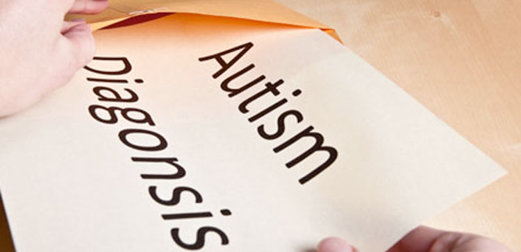 Paper with Autism Diagnosis written on it