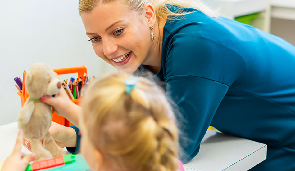 Therapist with a young girl