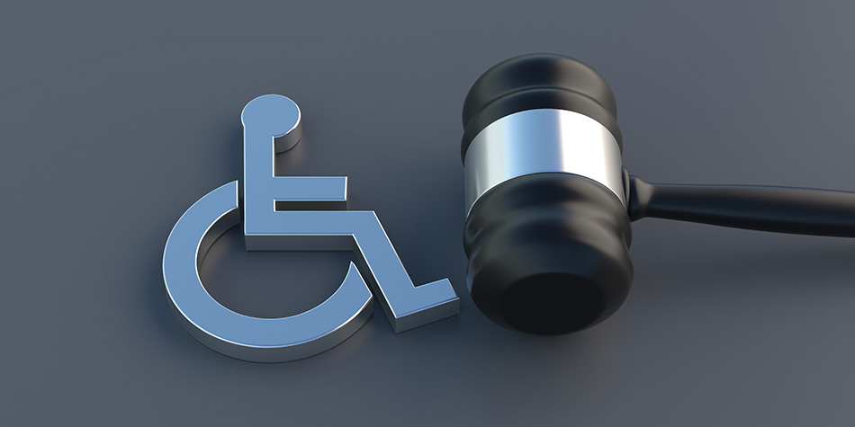 A legal gavel sitting beside a disability logo