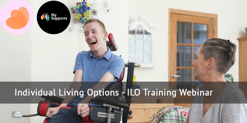 Happy young man in a wheelchair with a friend