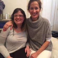 Amanda sitting with her physiotherapist Moira Mannion 