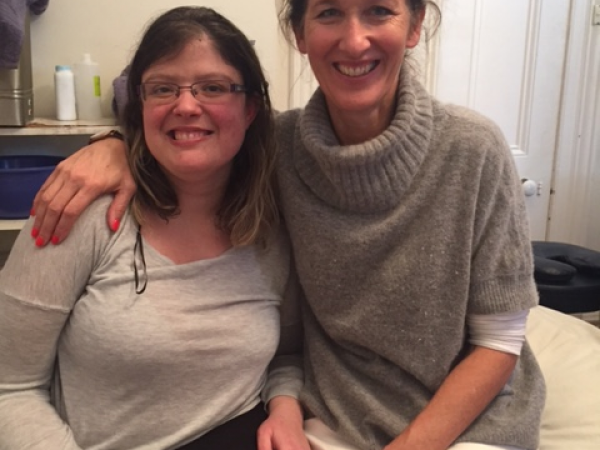 Amanda sitting with her physiotherapist Moira Mannion 