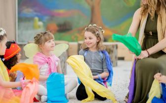 Kids doing crafts and playing